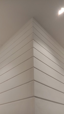 A close-up of a freshly painted interior wall in a modern home.