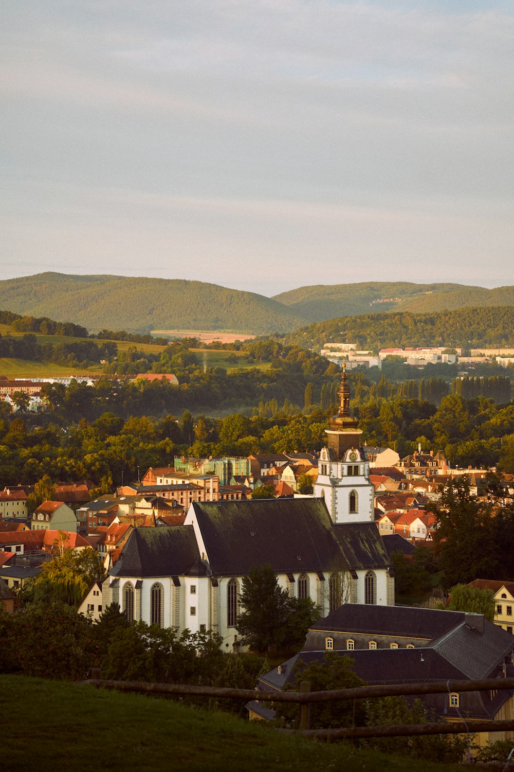 a small town with a church in the middle of it