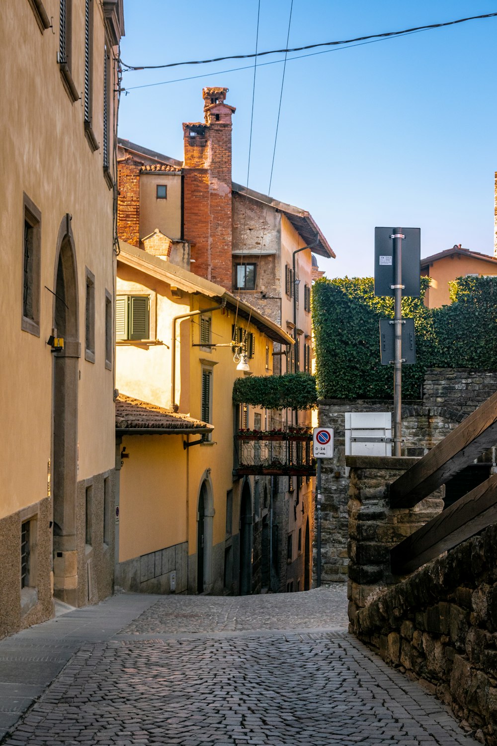 a cobblestone street in a small town