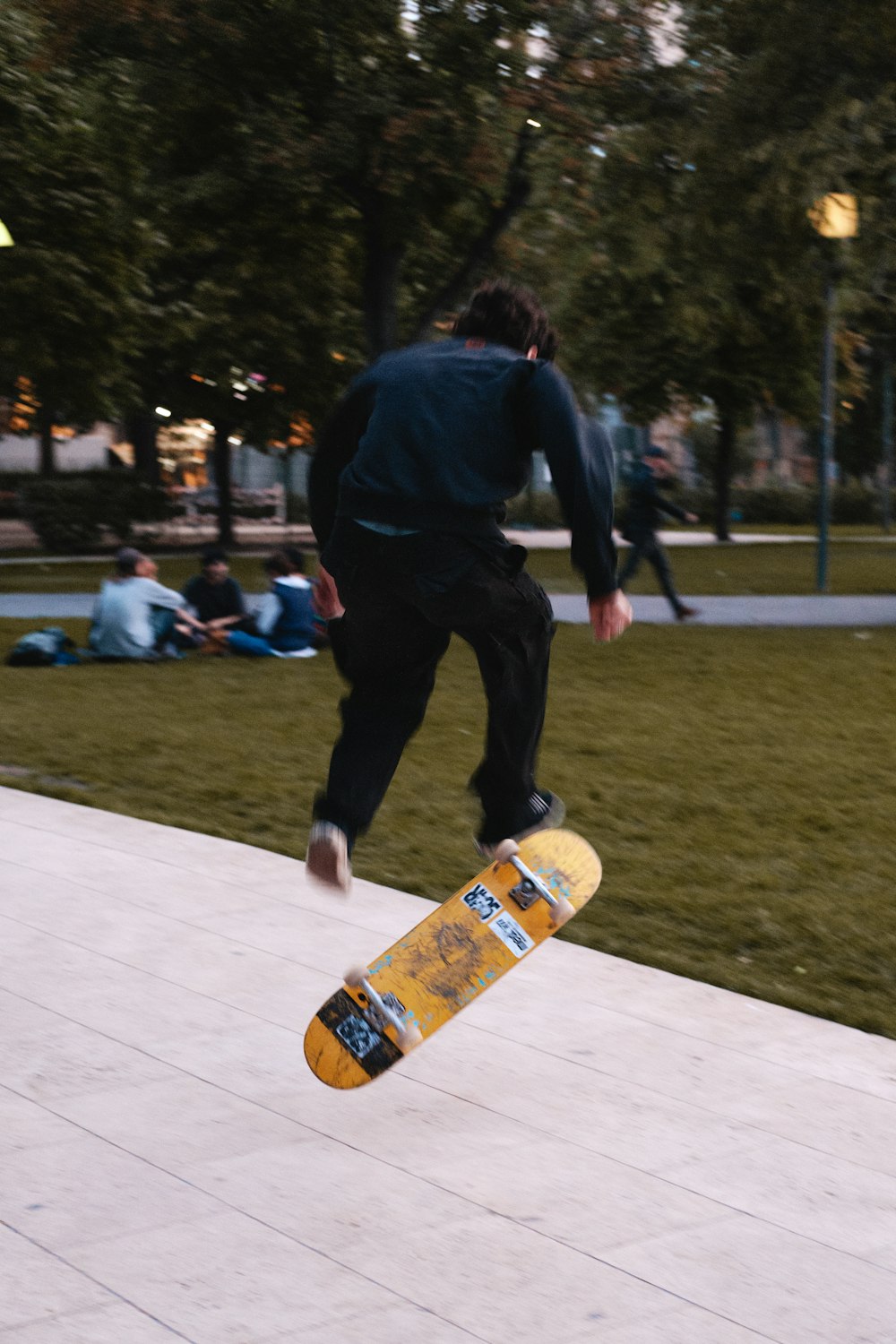 a person jumping a skate board in the air