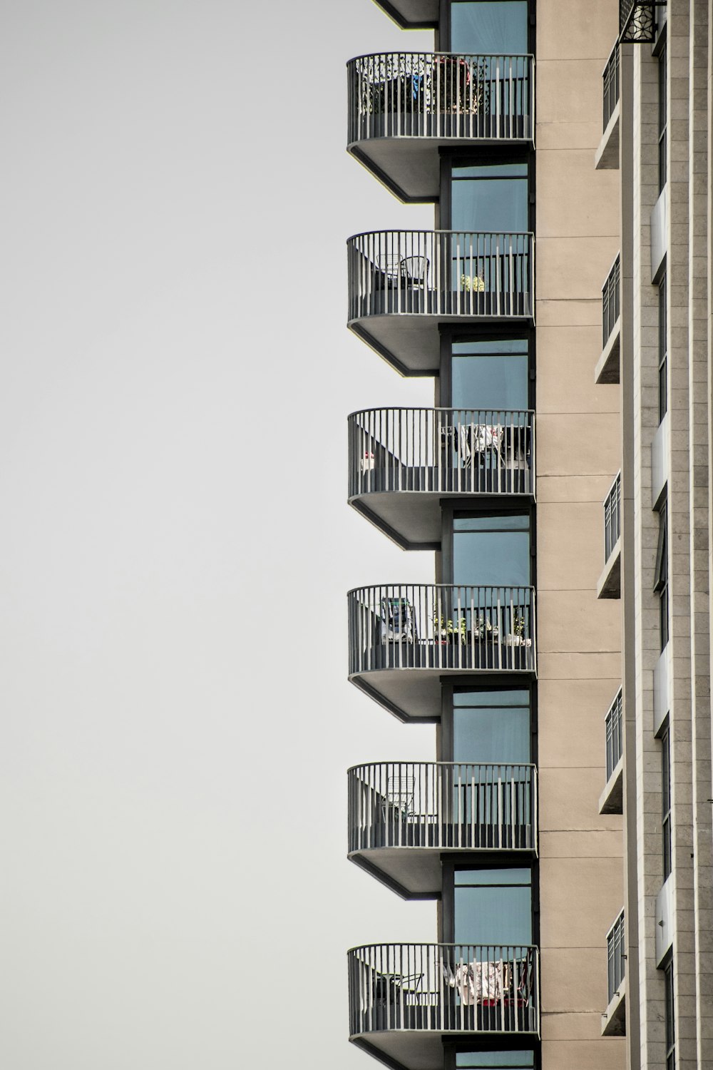 a tall building with balconies and balconies on the balconies