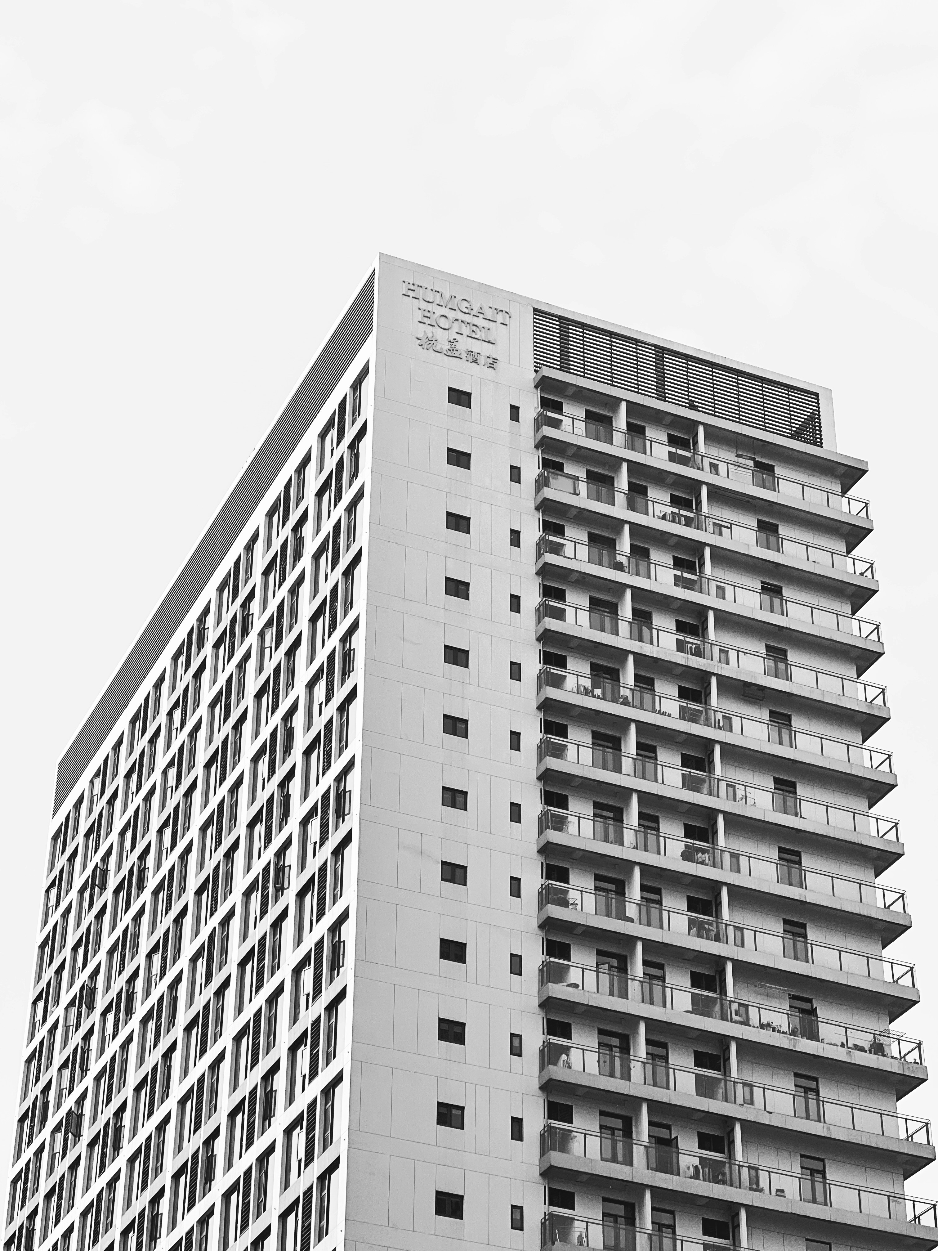 a tall building with balconies and balconies on it