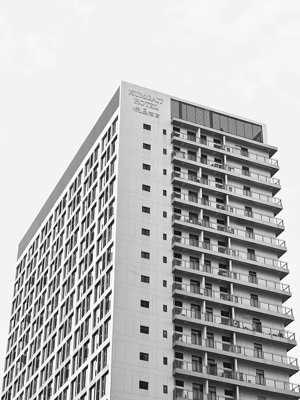 a tall building with balconies and balconies on it