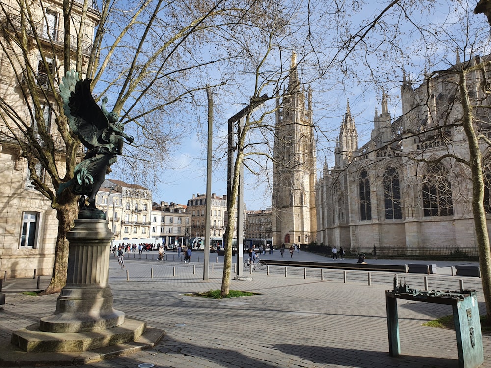 a statue of a man on a horse in a city square