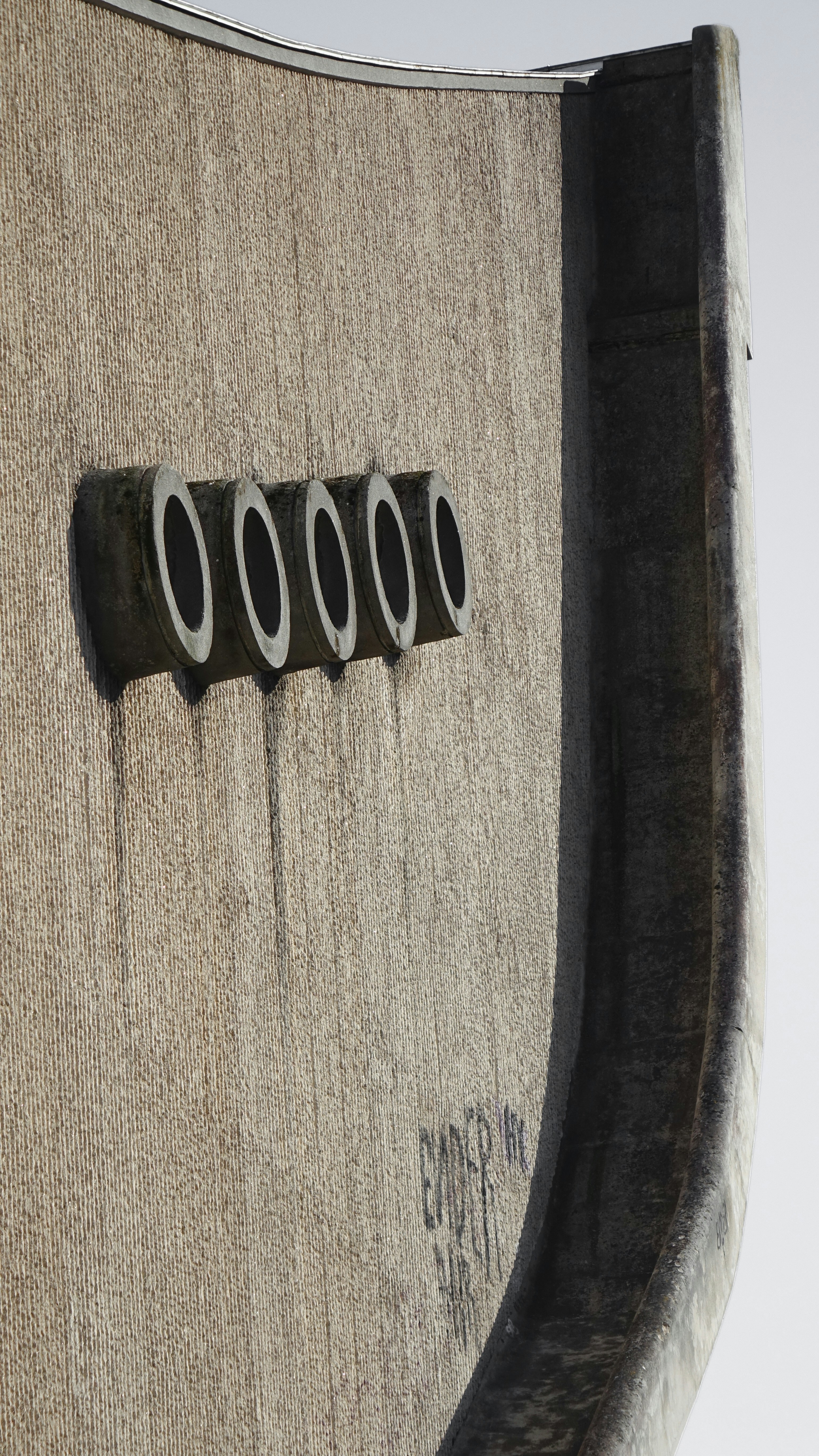 a close up of a building with a sign on the side of it
