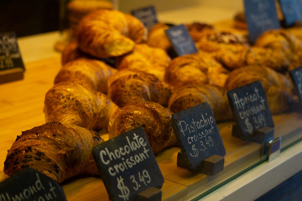 a bunch of croissants that are on a table