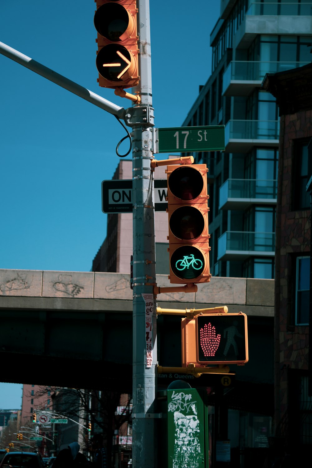 a traffic light with a bike sign on it