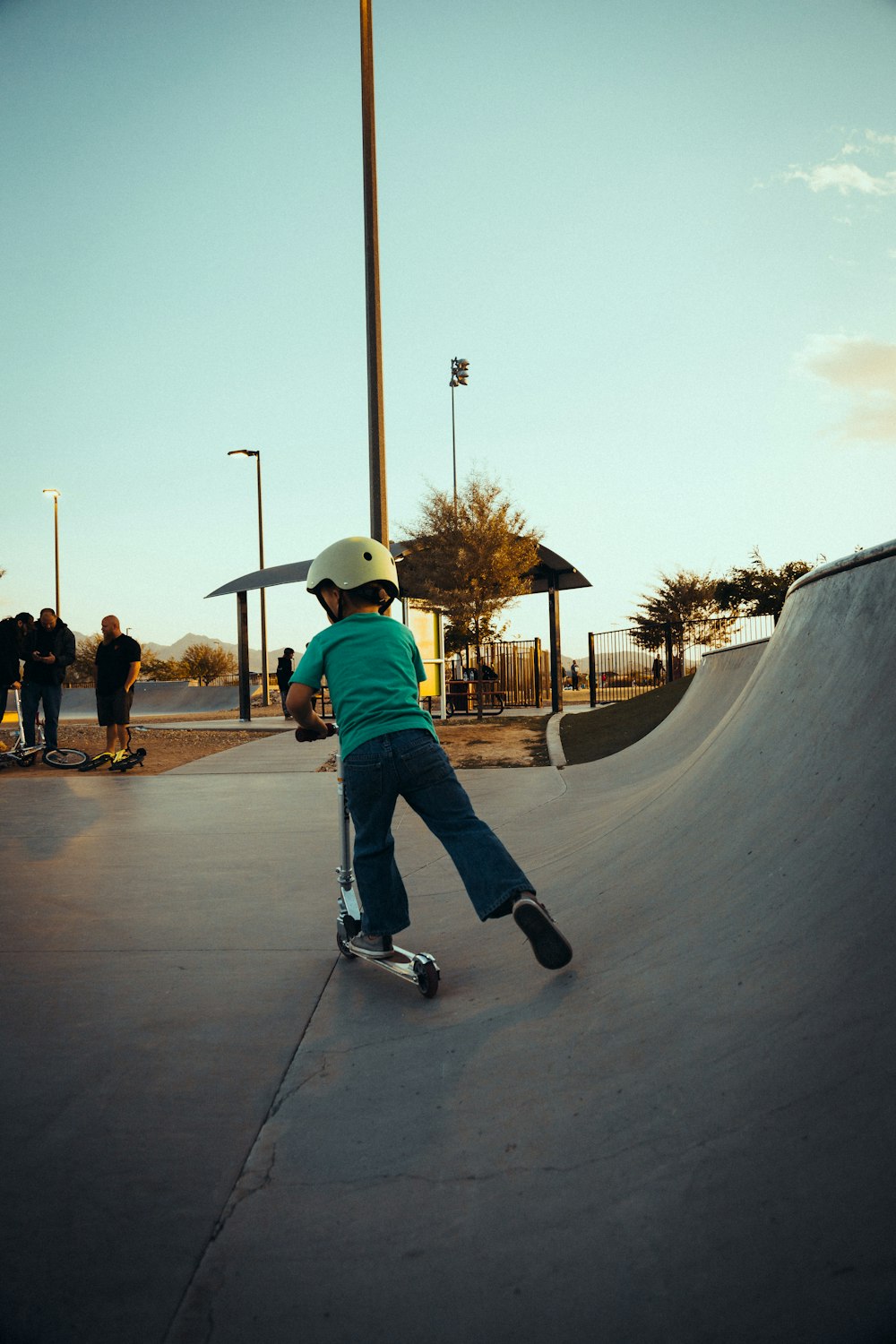 a person riding a skate board on a ramp