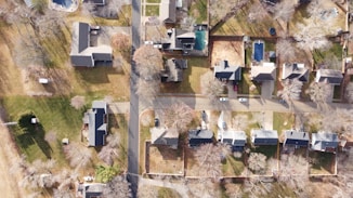 an aerial view of a neighborhood with lots of houses