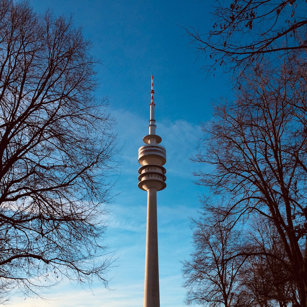 a tall tower with a clock on top of it