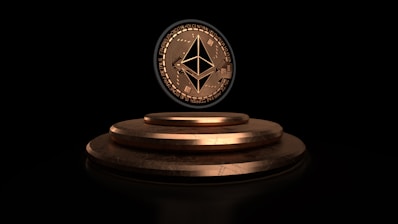 a stack of gold coins sitting on top of each other