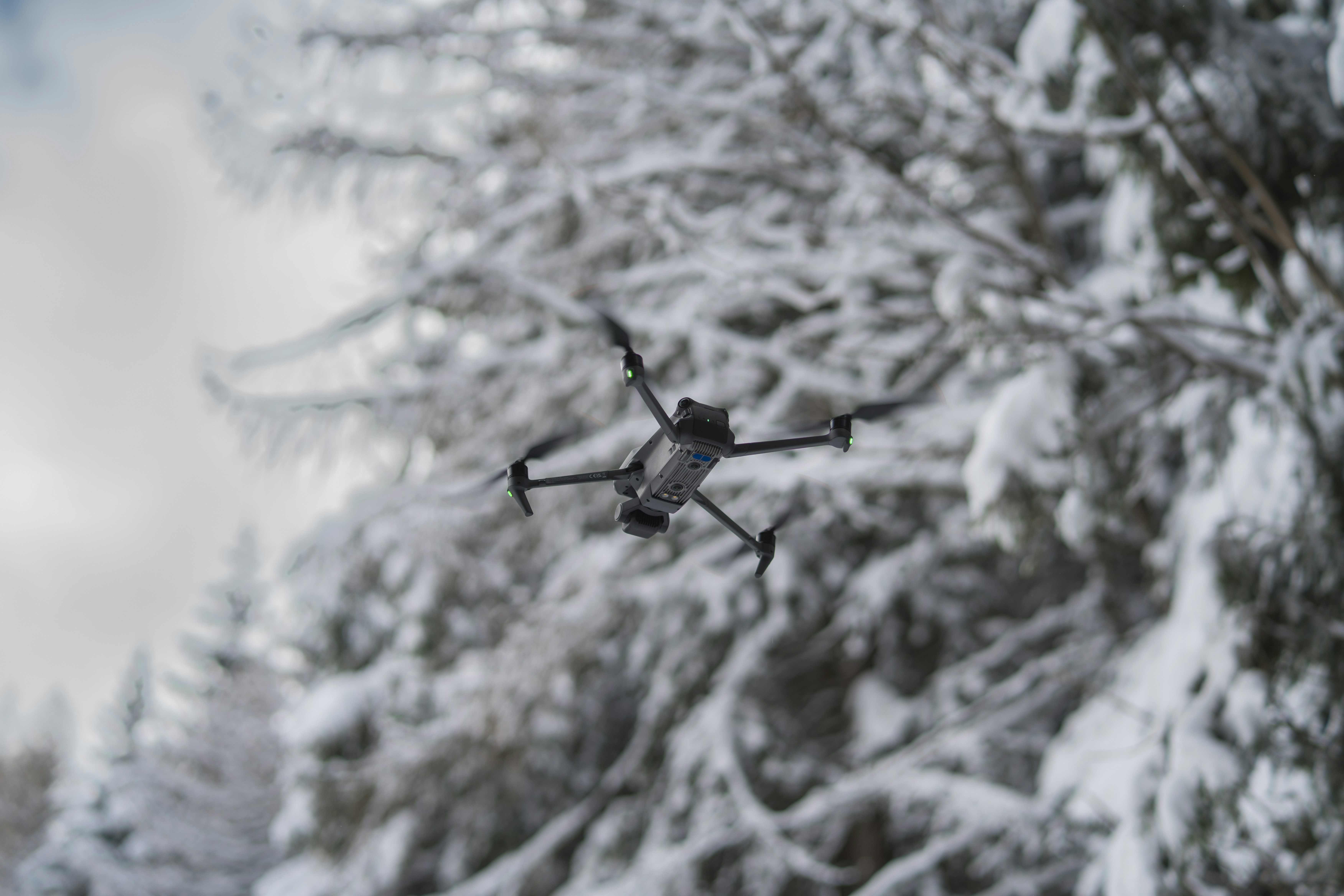 a camera attached to the back of a remote control helicopter