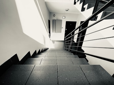 a black and white photo of a staircase