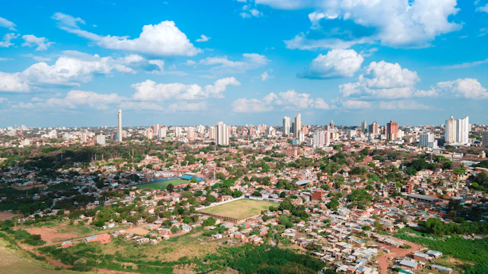 High-rise buildings under scattered clouds in Asunción, Paraguay