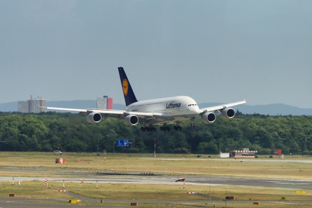 a large jetliner taking off from an airport runway