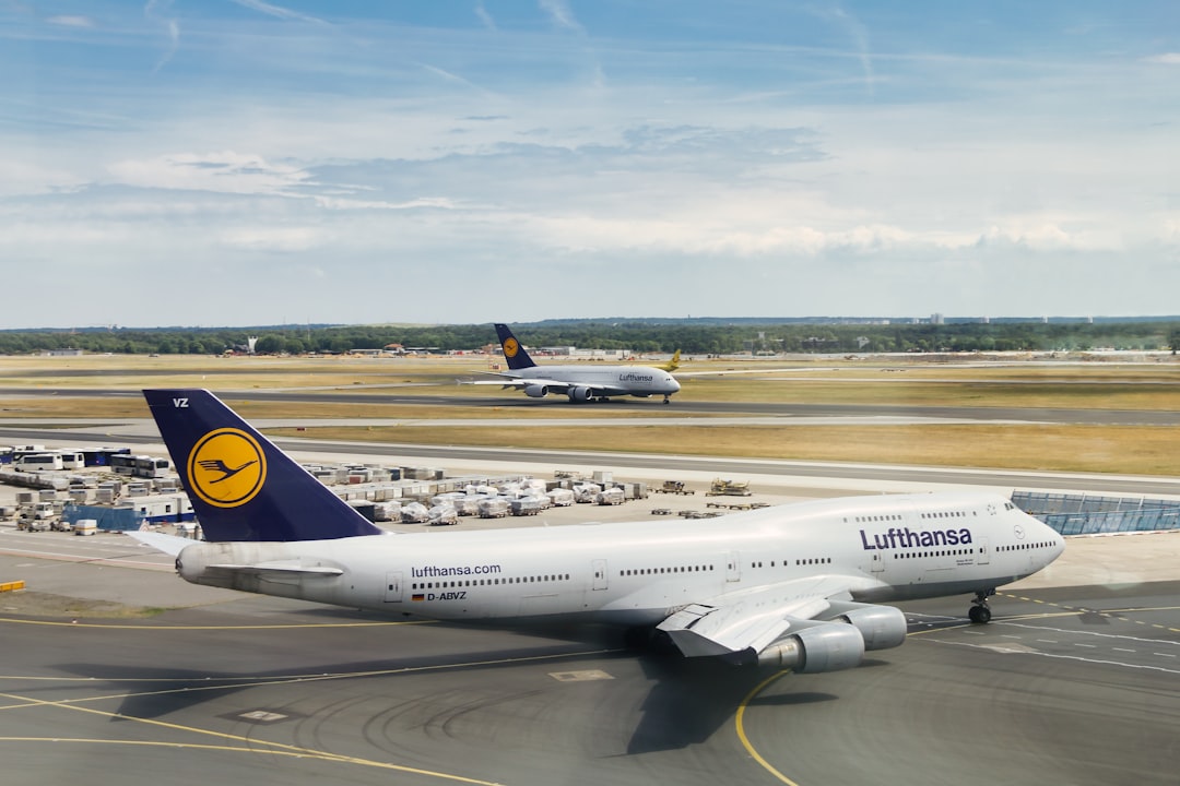 a large jetliner sitting on top of an airport tarmac,
