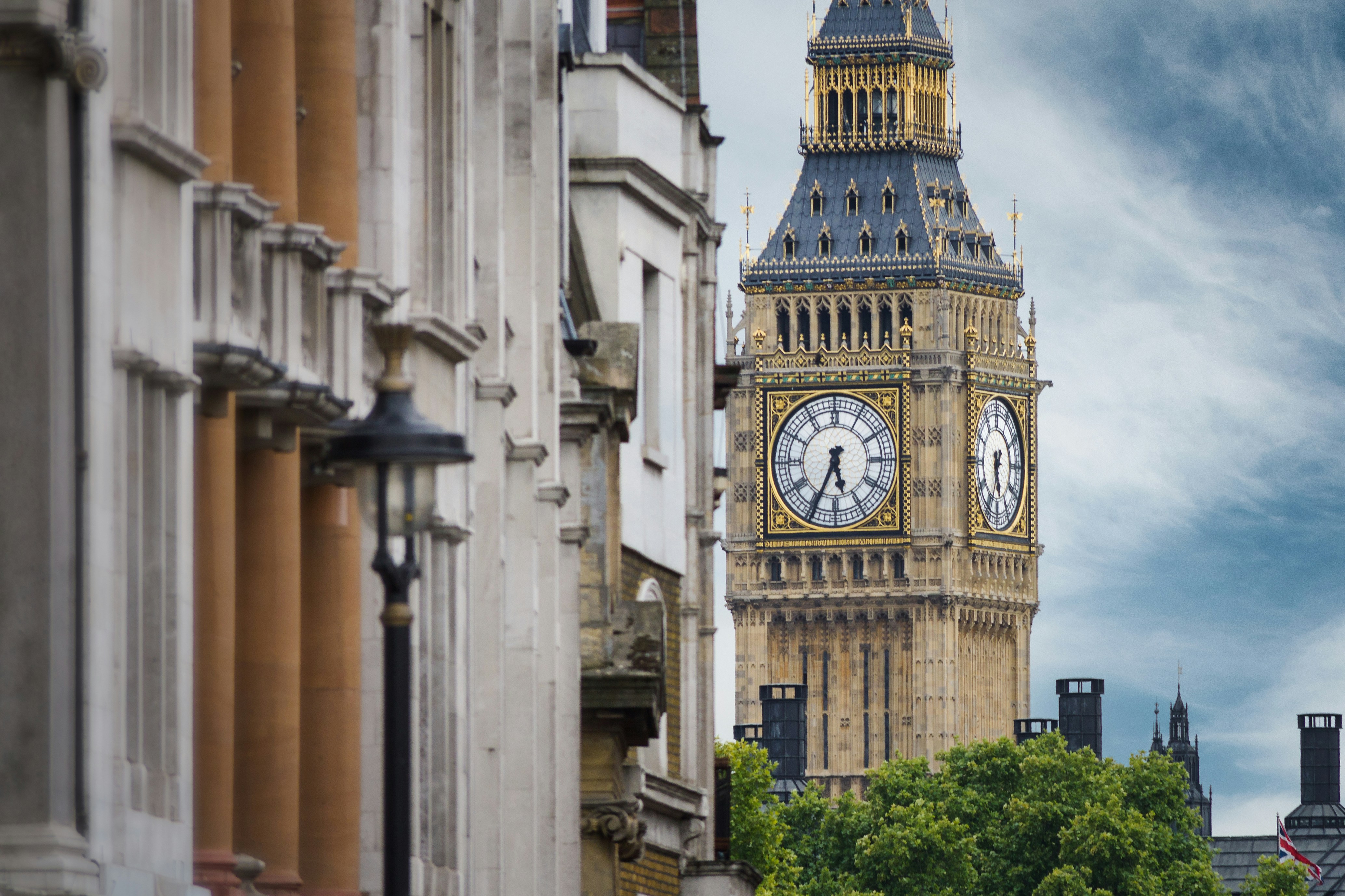 the big ben clock tower towering over the city of london