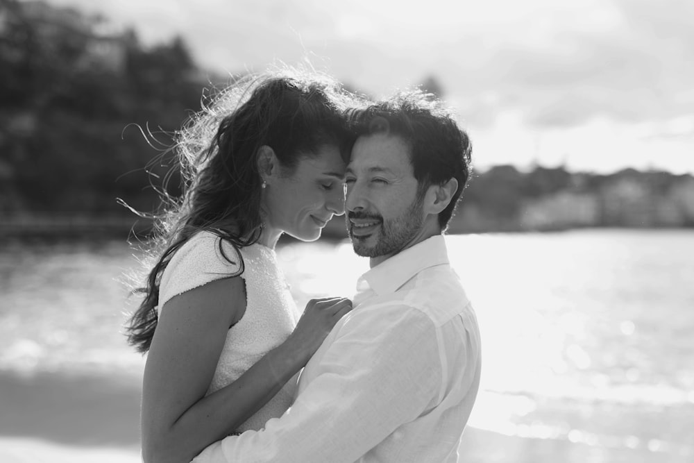 a black and white photo of a man and a woman