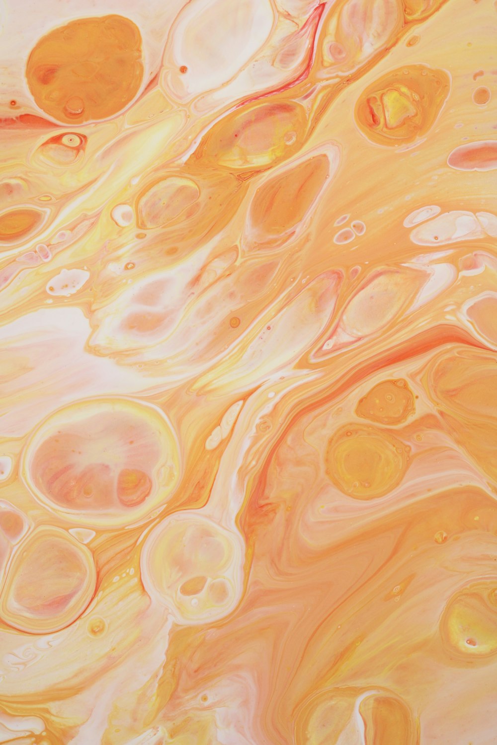 an abstract painting with yellow and orange colors