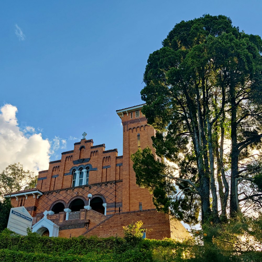 a tall brick building with a clock tower