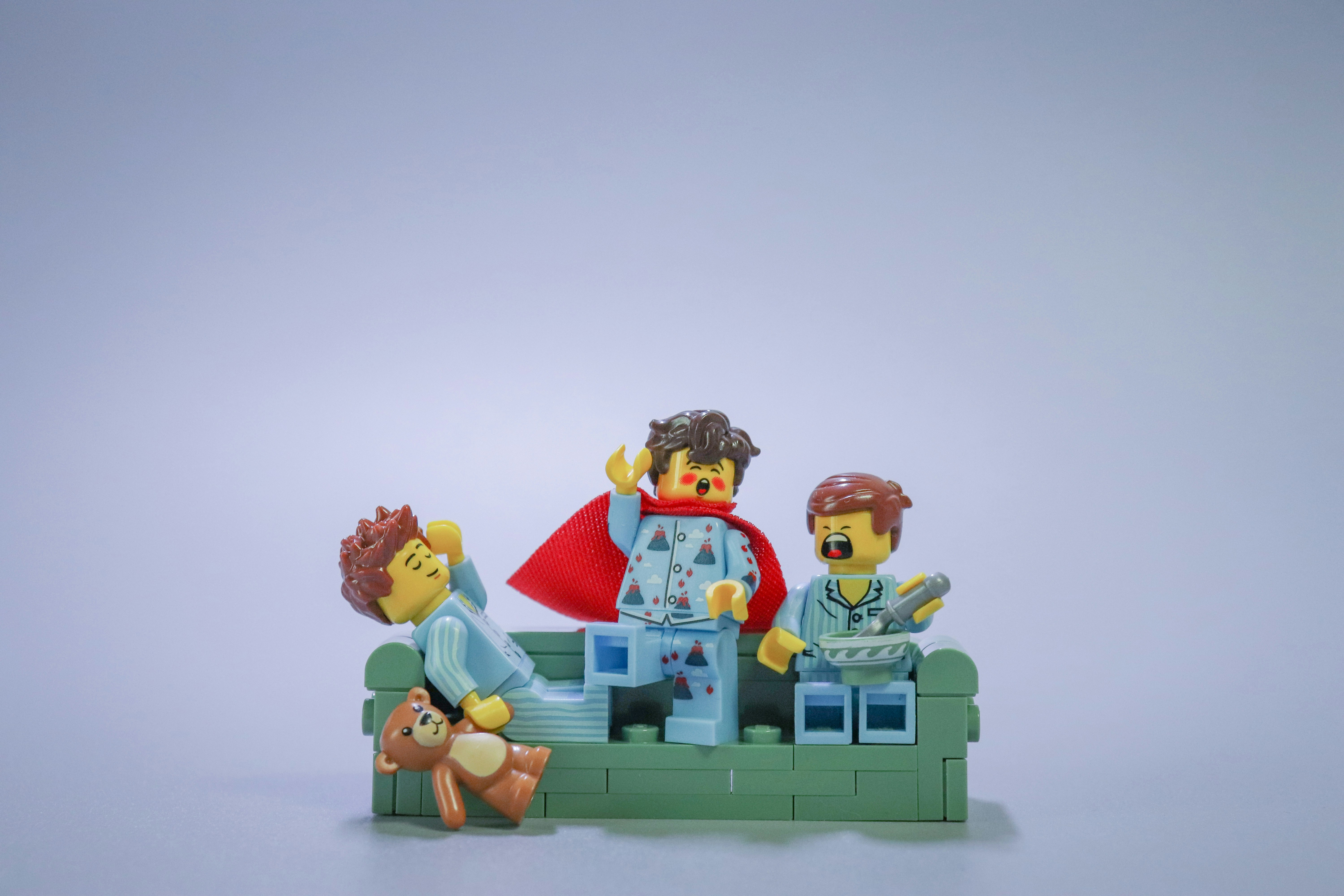 a group of lego figures sitting on top of a table