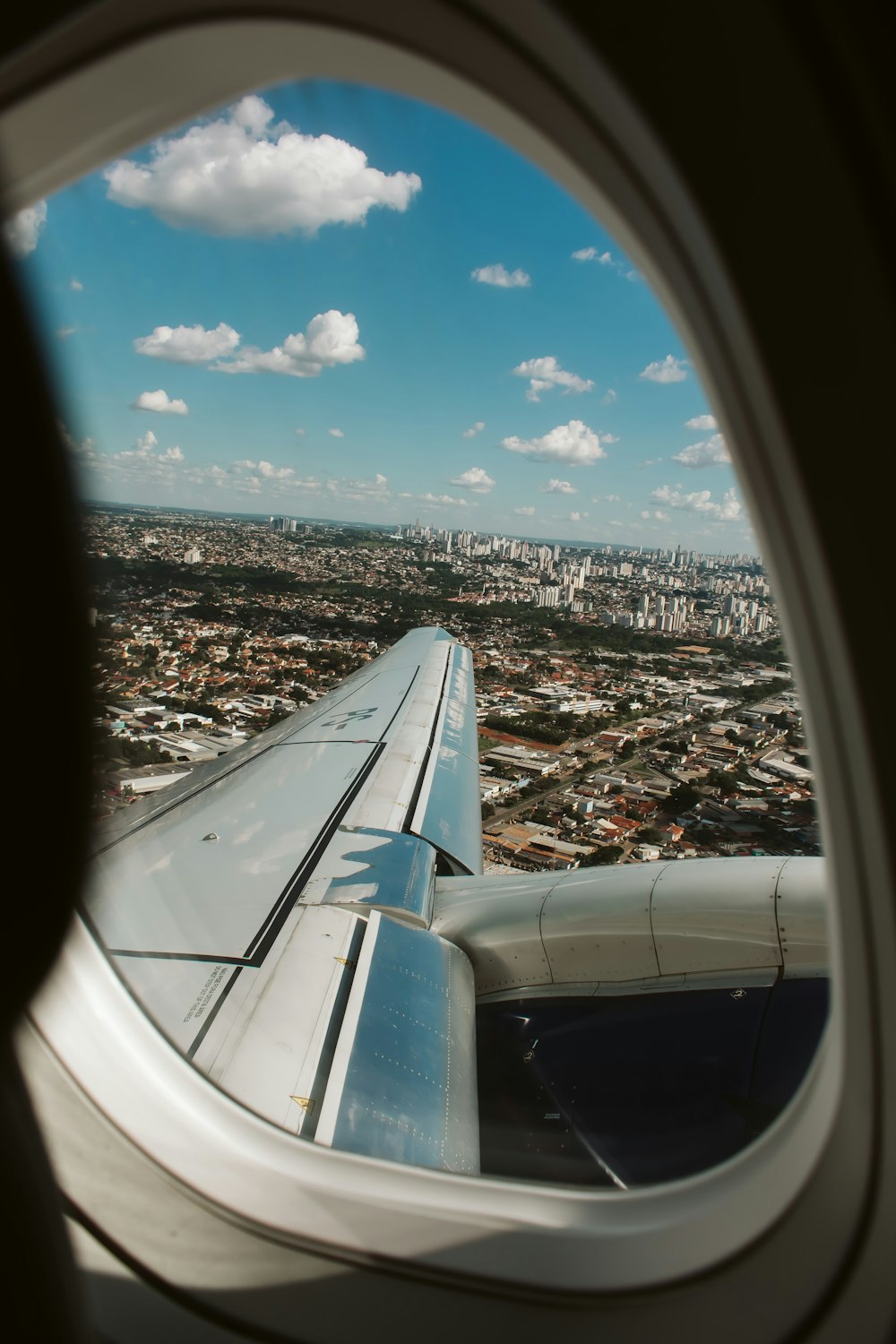 a view of a city from an airplane window