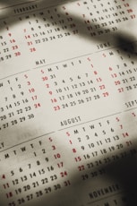 a close up of a calendar page on a table