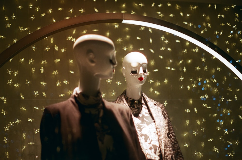 a couple of mannequins that are standing in a room