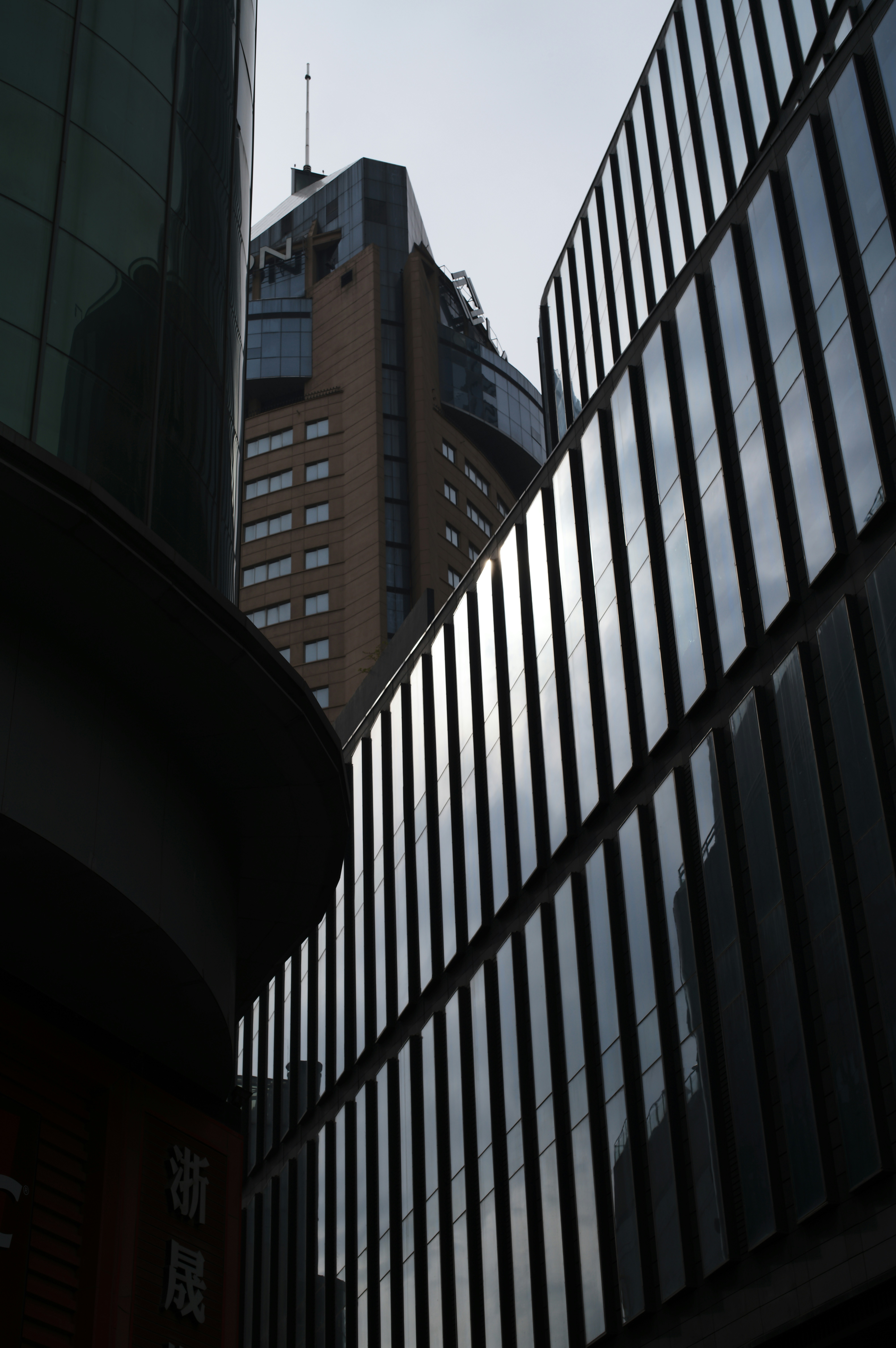 a tall building with a sky line in the background
