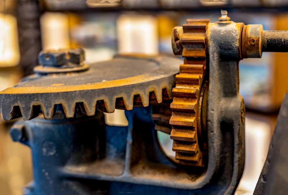 a close up of a machine gear with a blurry background
