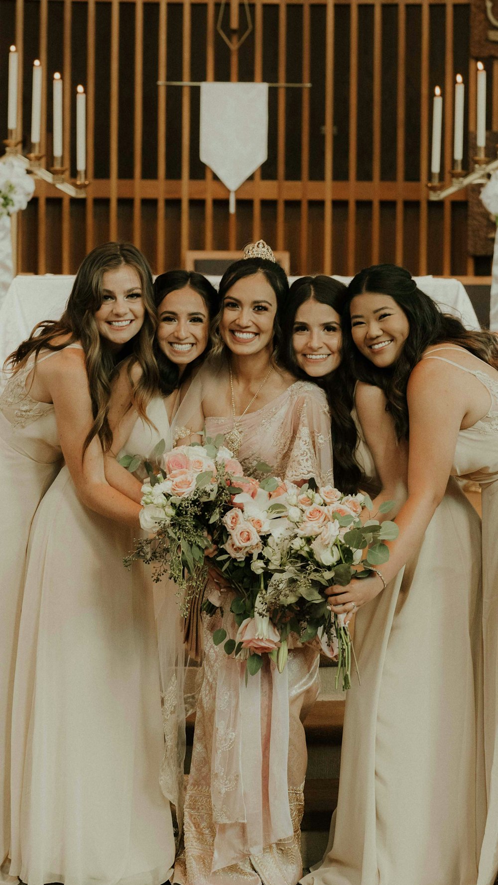 a group of women standing next to each other