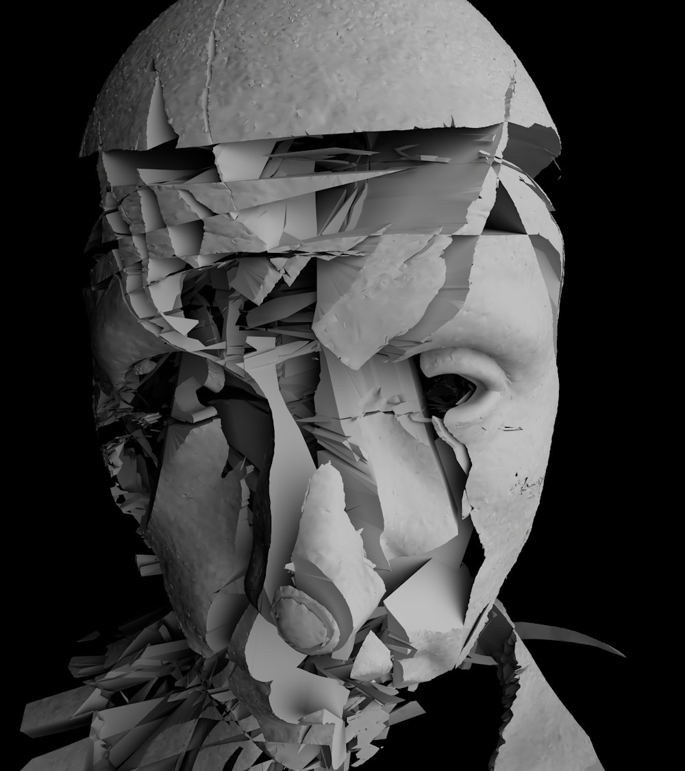 a black and white photo of a man's face covered in torn paper