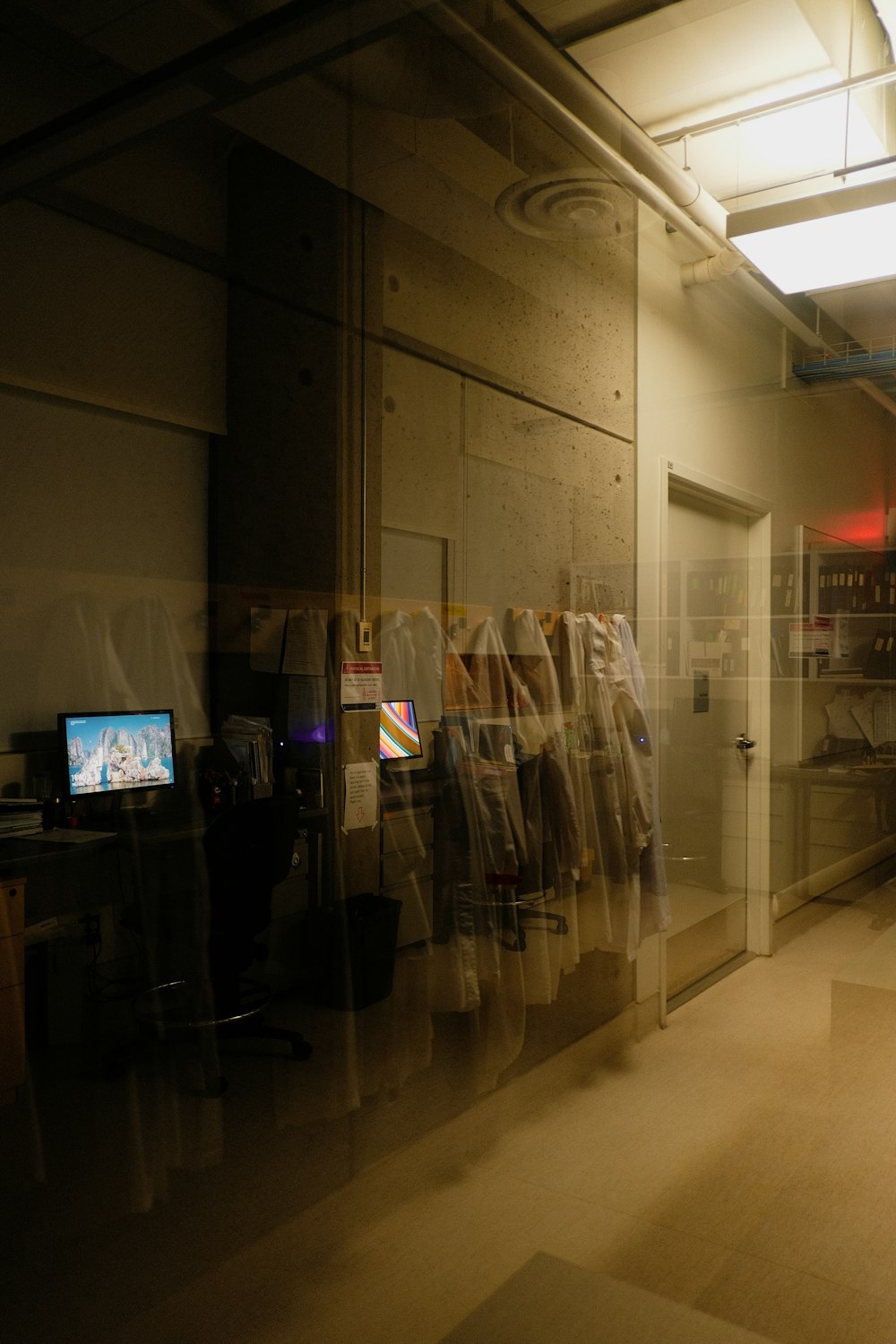 a blurry photo of a man standing in a room