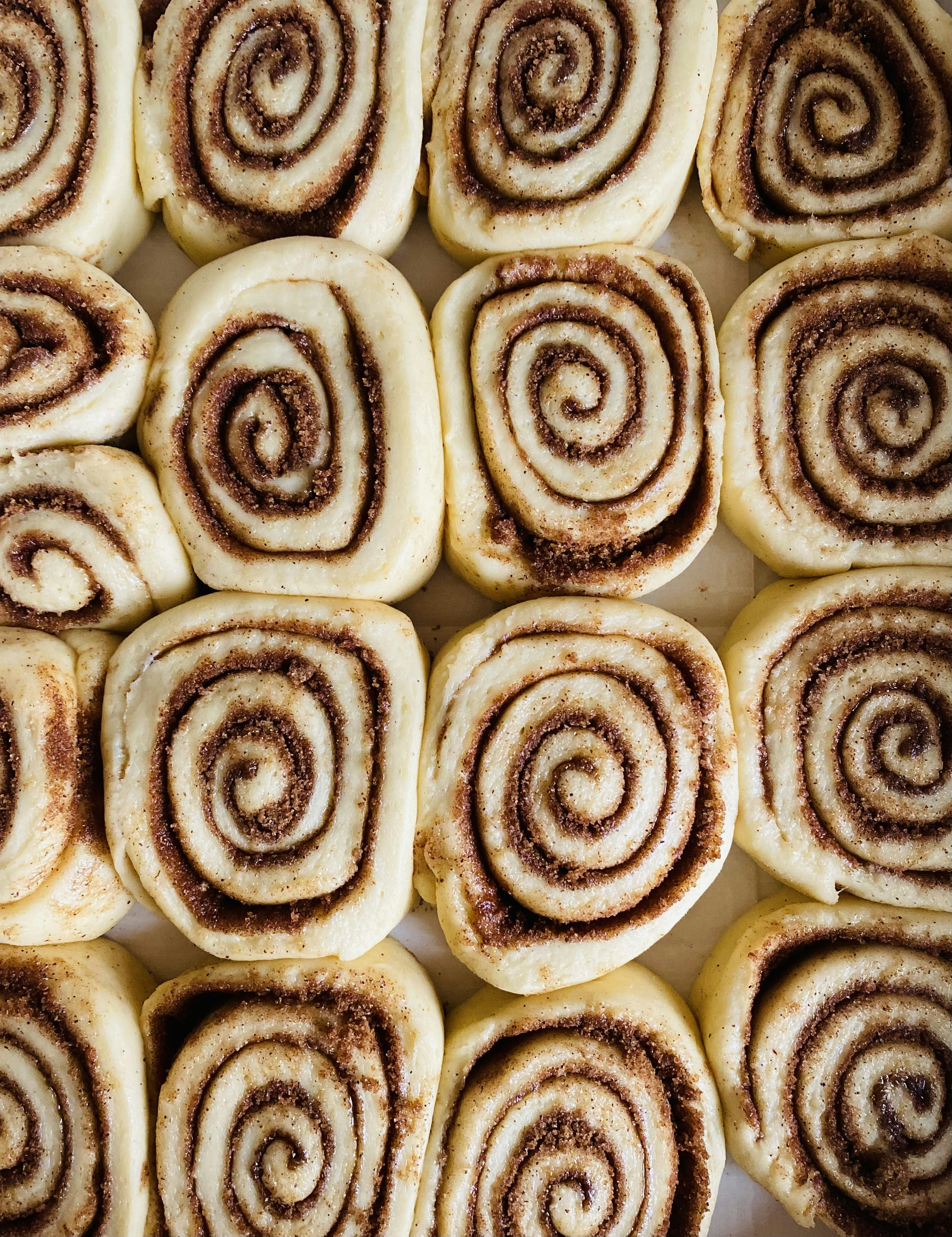 Unedited, unfiltered, original iPhone photo of made-from-scratch with Mom cinnamon rolls ready to be baked near Cleveland, Ohio
