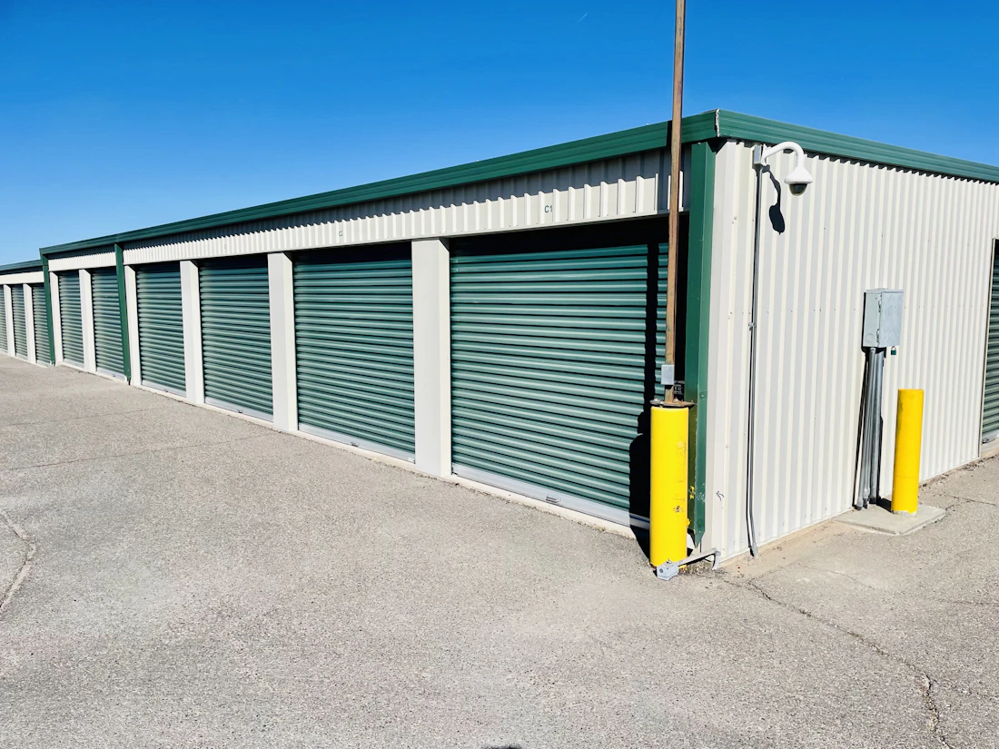 Drive-up storage units under a clear sky
