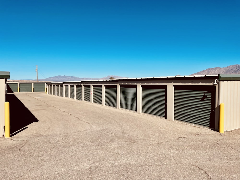 a row of storage units in a parking lot