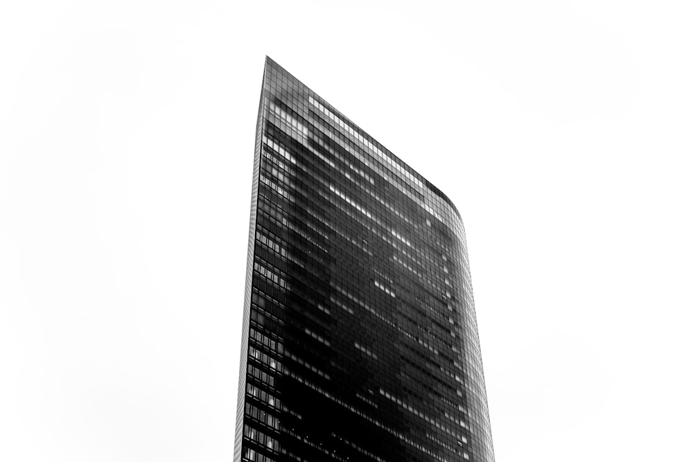a black and white photo of a tall building
