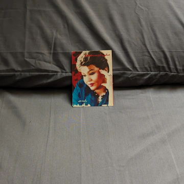 Sleek magazine cover glowing with neon blue highlights.