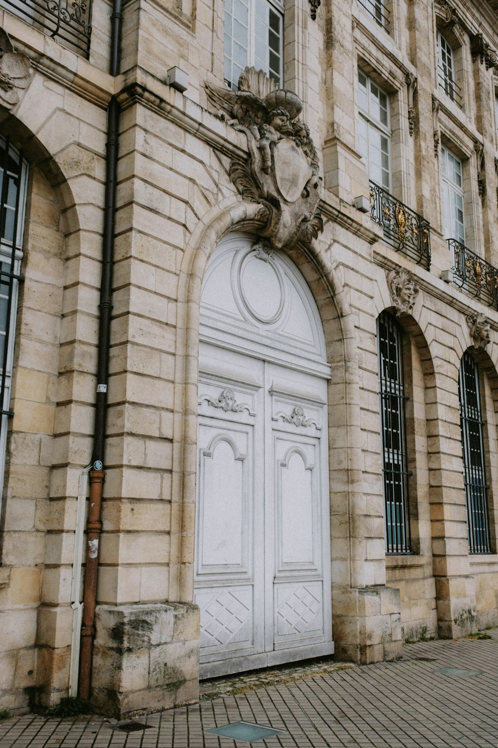 an old building with a large white door