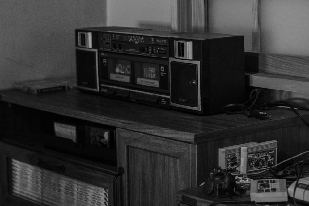 an old radio and other electronic equipment on a table