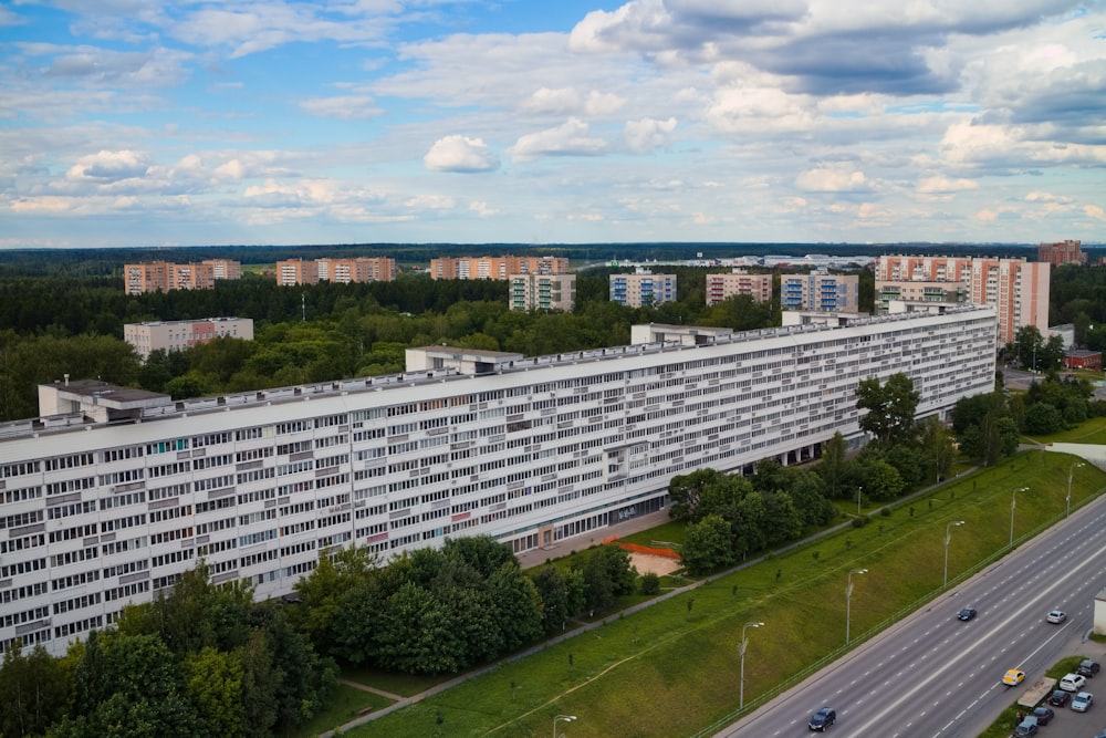 an aerial view of a large white building