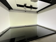 Smooth, polished floor tiles installed in a modern living room.