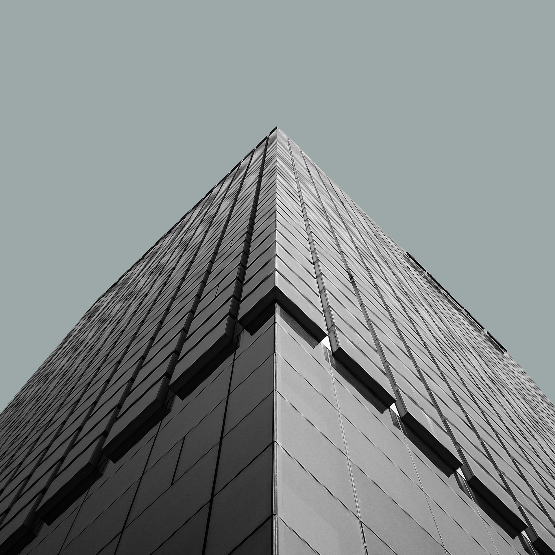 a black and white photo of a tall building