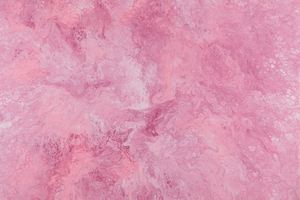 a close up of a pink marble texture