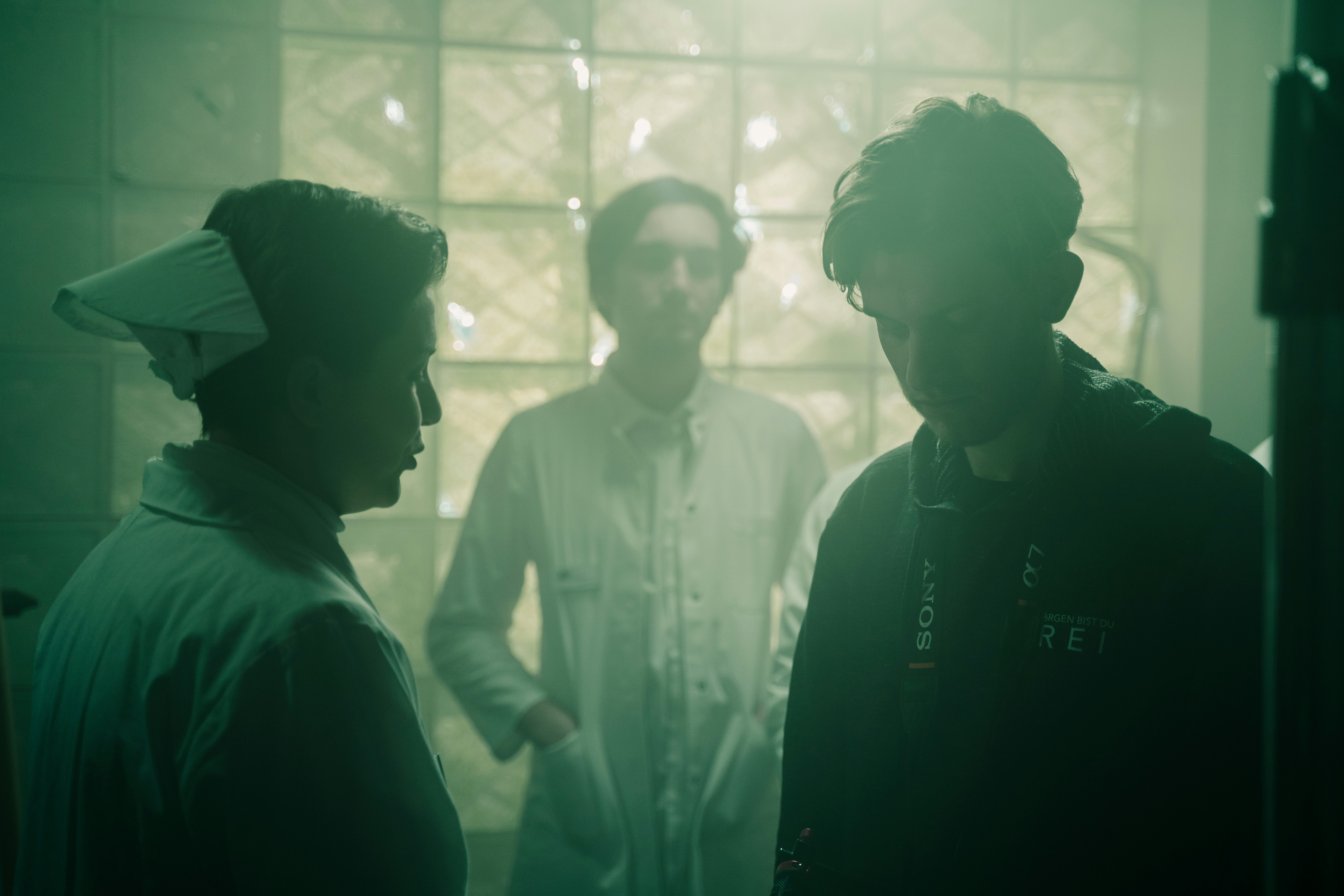 a group of men standing next to each other