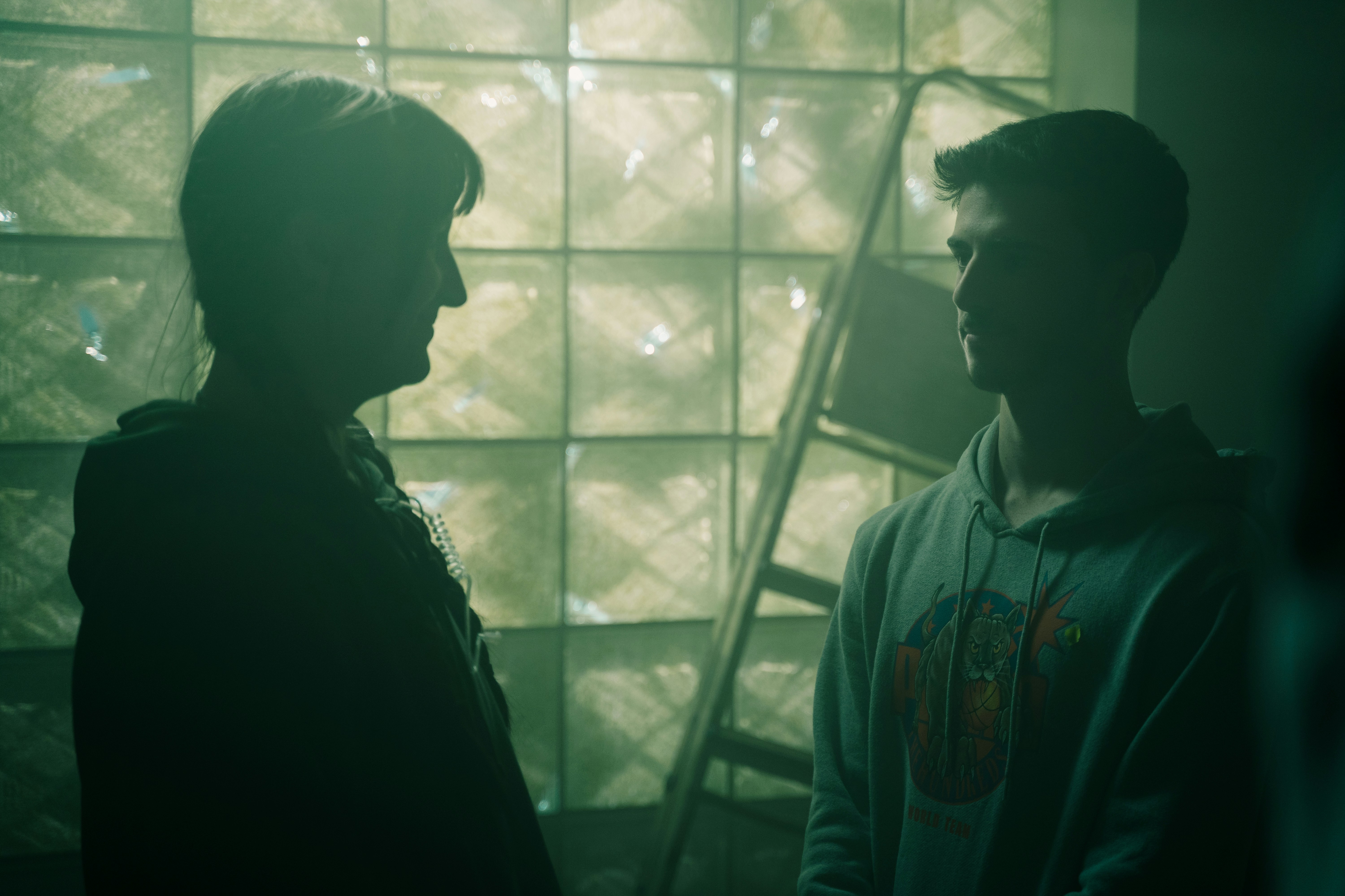 a man and a woman standing next to each other