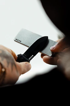 a person holding a knife in their hand