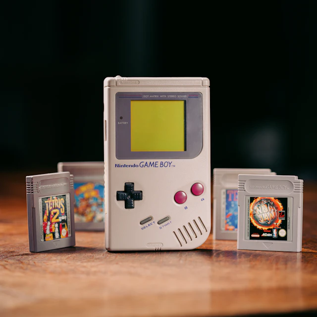 Nintendo Game Boy sitting on top of a wooden table
