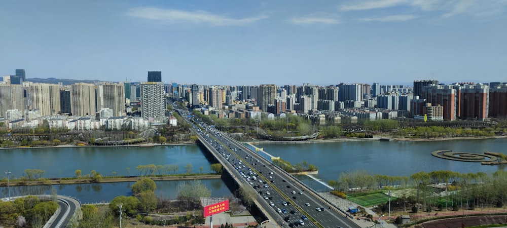 a view of a city and a bridge over a river