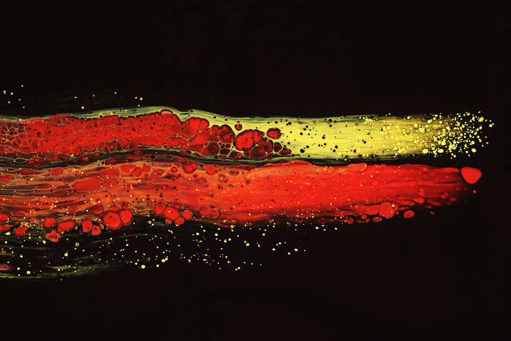 a painting of red, yellow, and green colors
